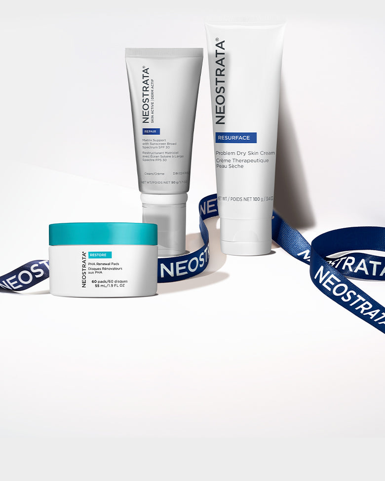 Three Neostrata products wrapped in a blue ribbon against a white background.